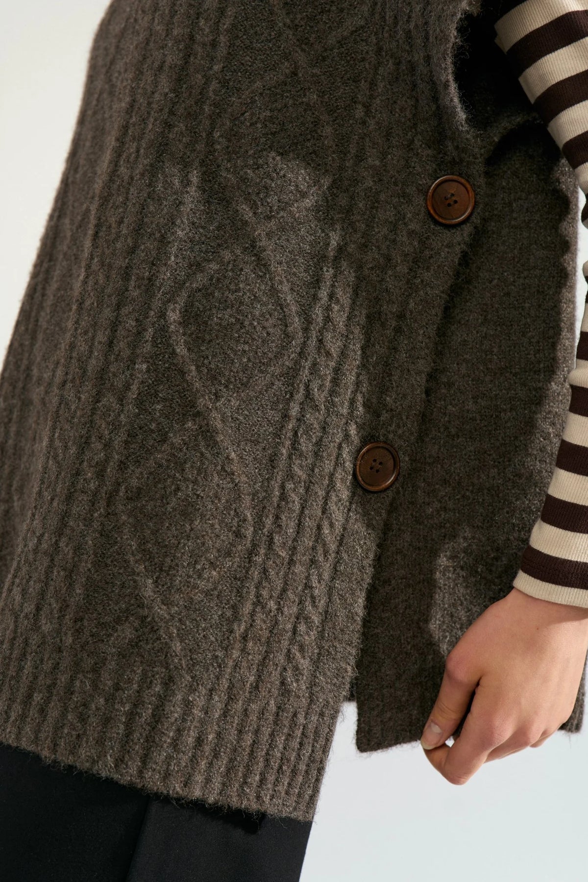 Nümph Nujoline Black Coffee poncho with cable knit panel and side buttons – detail view