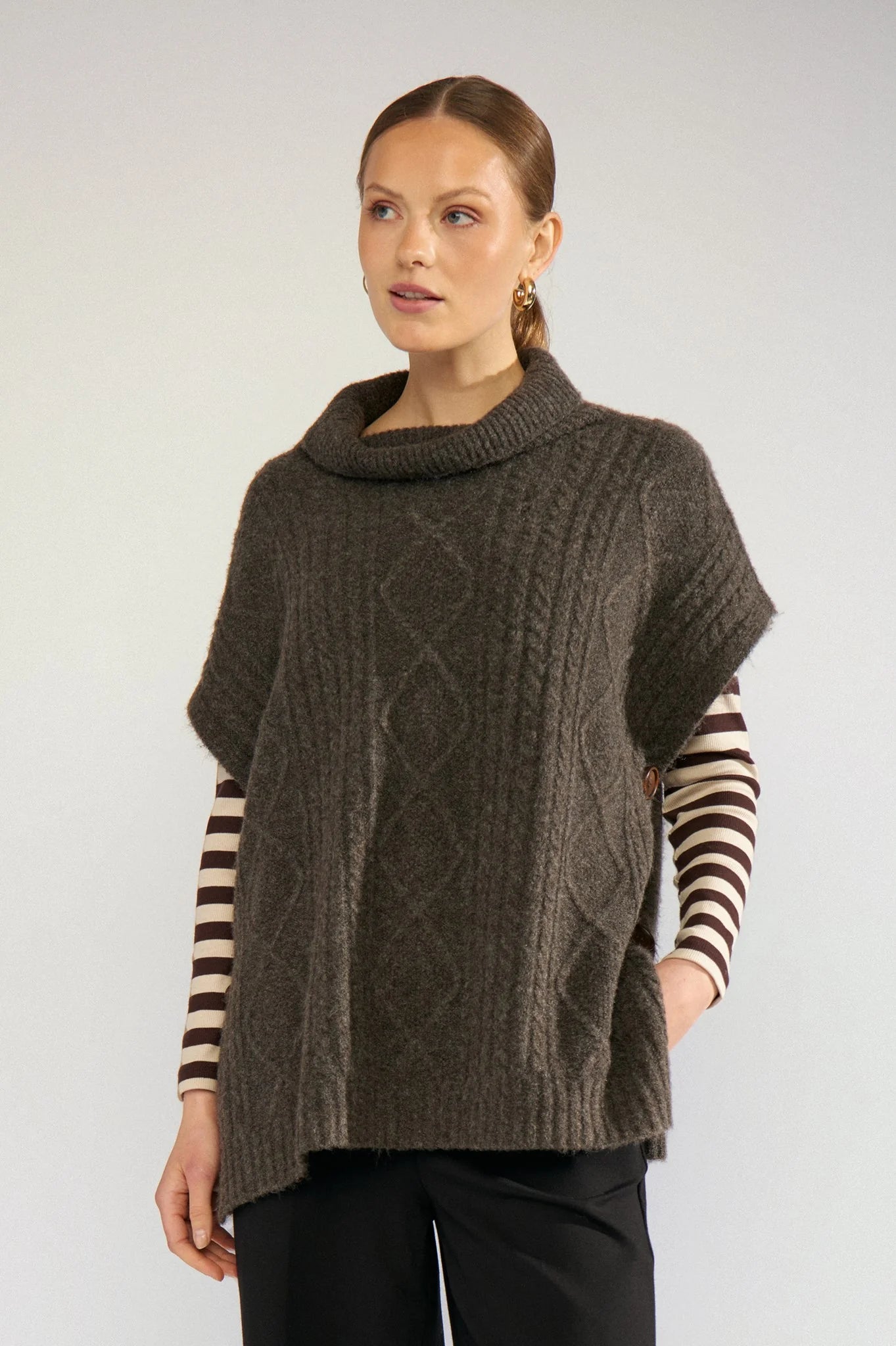 Nümph Nujoline Black Coffee cable knit poncho with roll neck – front model view