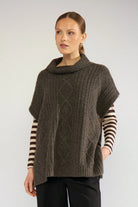 Nümph Nujoline Black Coffee cable knit poncho with roll neck – front model view