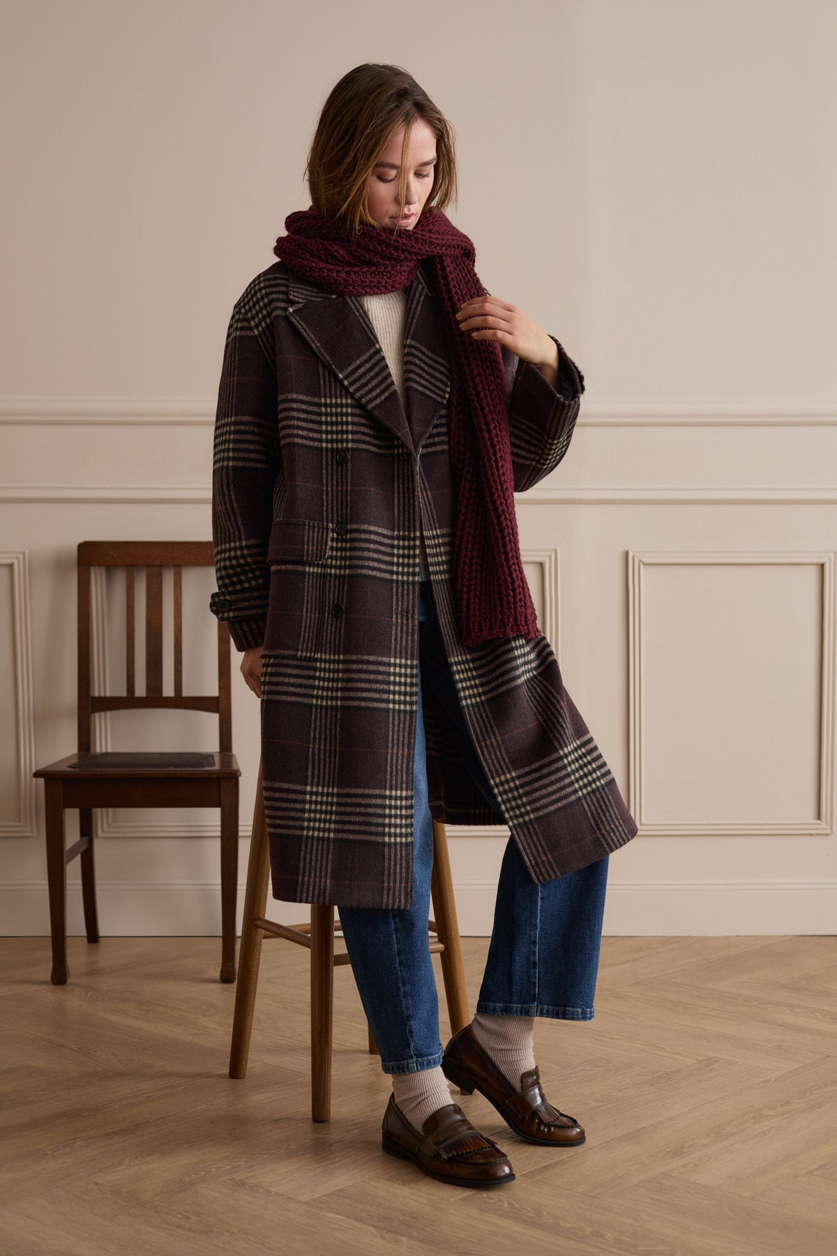 Oui bright blue barrel leg jeans styled with checked coat – lifestyle view