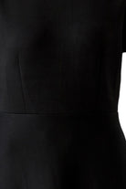 Oui black stretch crepe midi dress with shaped waist seam – close-up detail