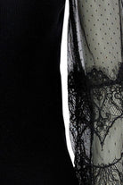 Oui black jumper with dotted mesh and floral lace sleeve – detail view