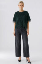 Oui Scarab Green fringe top styled with dark wide-leg trousers – full outfit view
