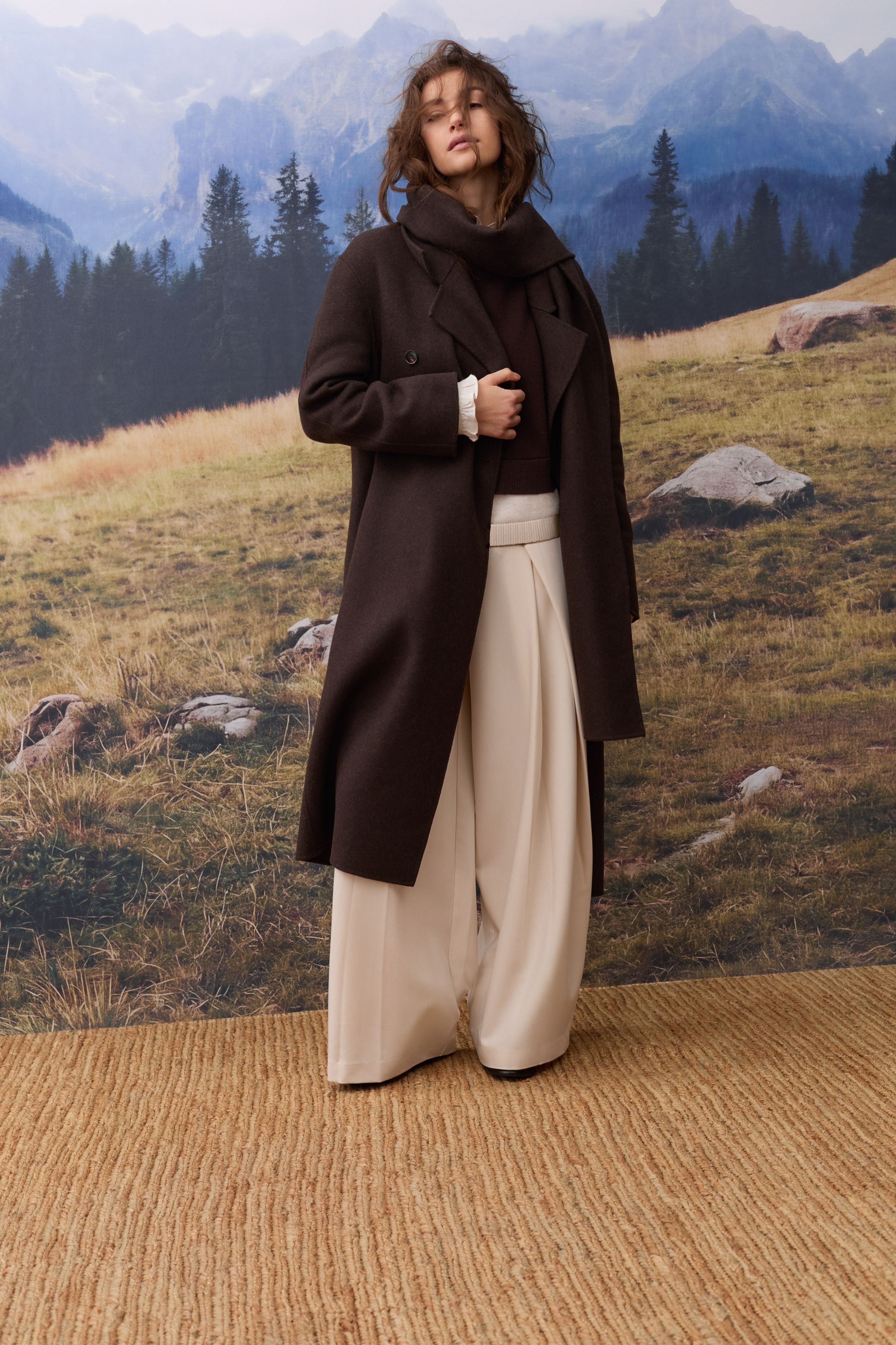 Oui chocolate brown wool blend scarf coat styled with cream wide-leg trousers – lifestyle view