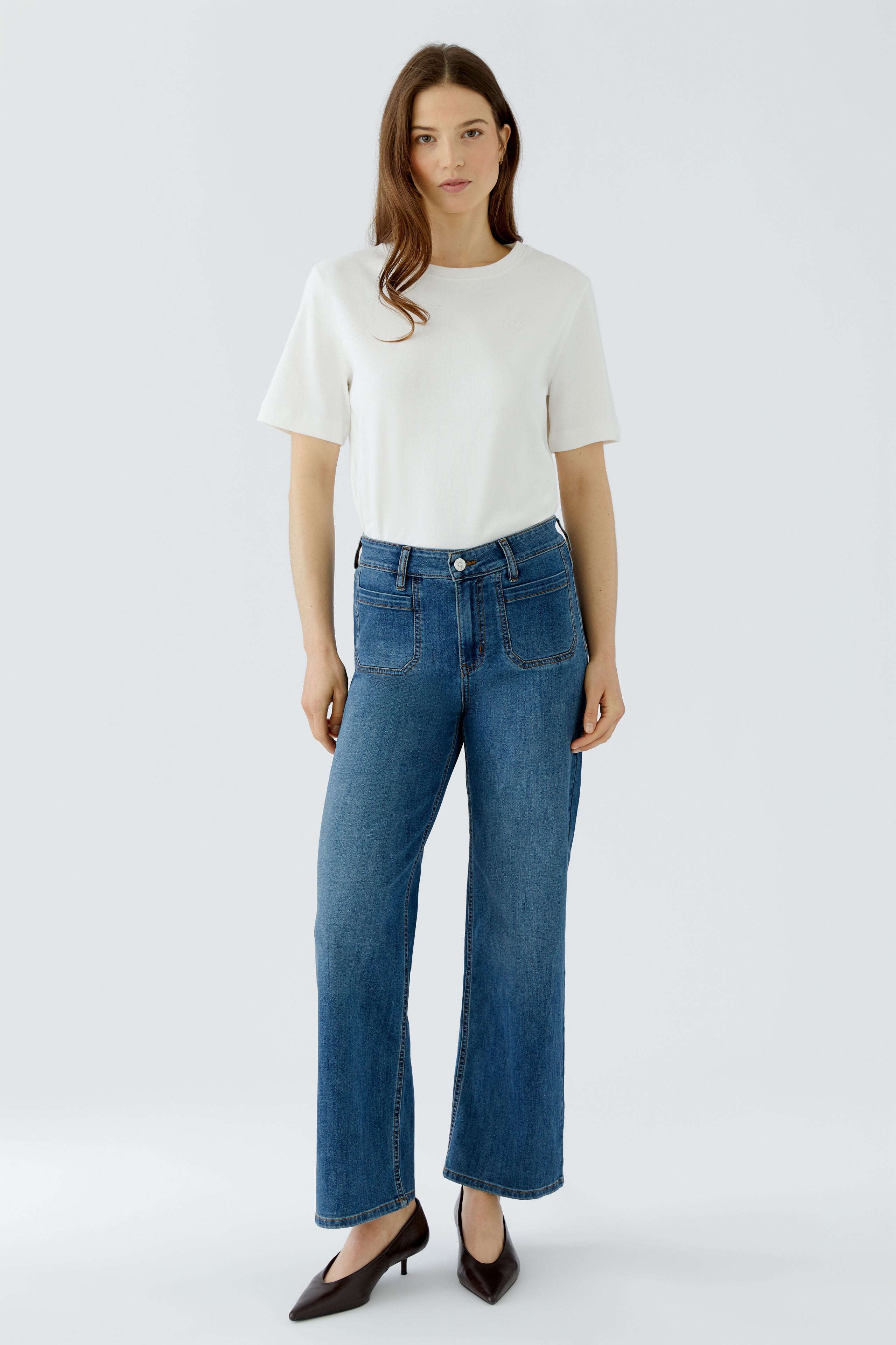 Oui blue straight leg patch pocket jeans styled with white top – front model view