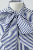 Oui blue and white striped blouse with oversized bow neckline – detail view