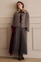 Oui taupe faux fur collar jacket styled with pleated midi skirt – lifestyle view