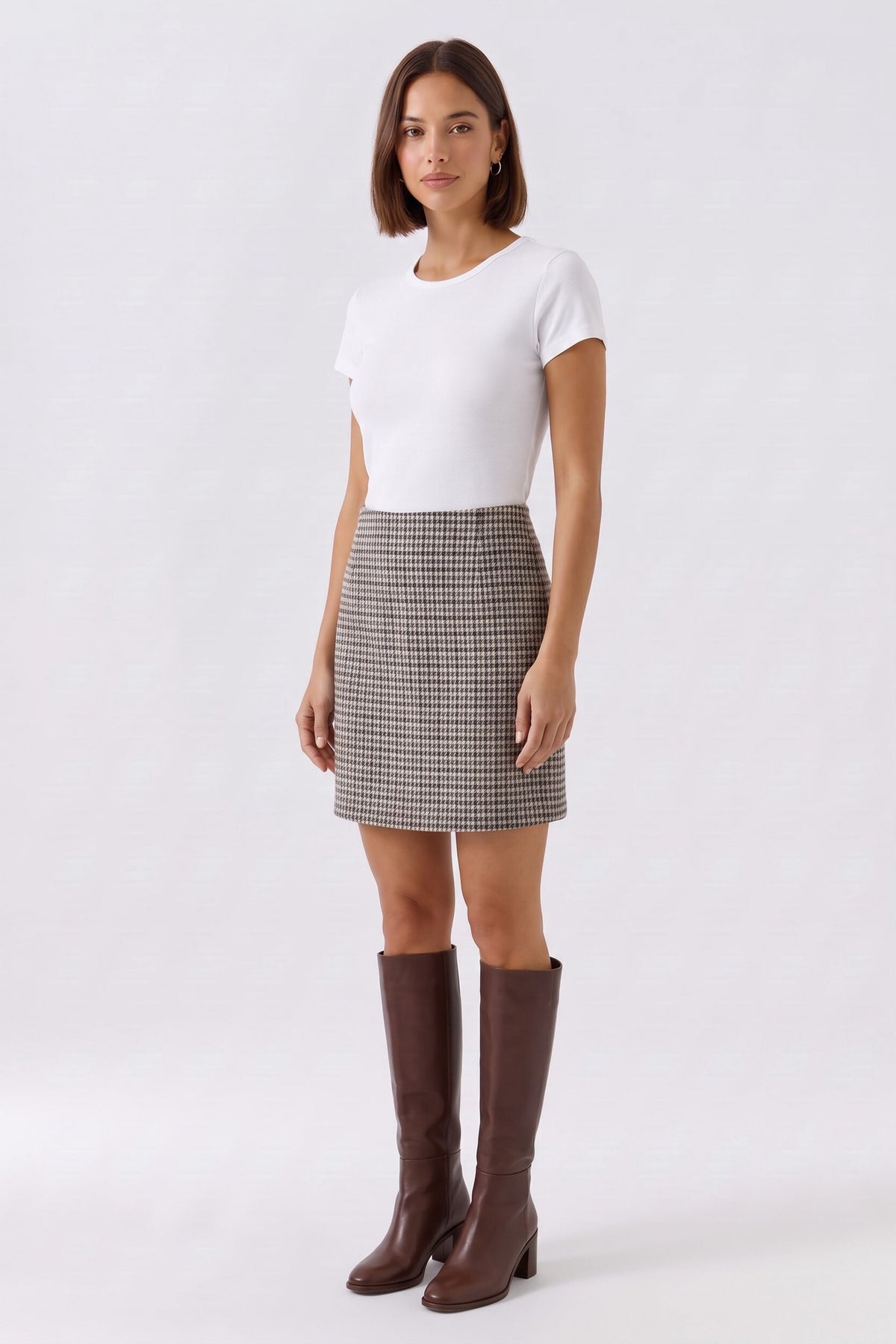 Oui brown check mini skirt with clean A-line shape – angled model view