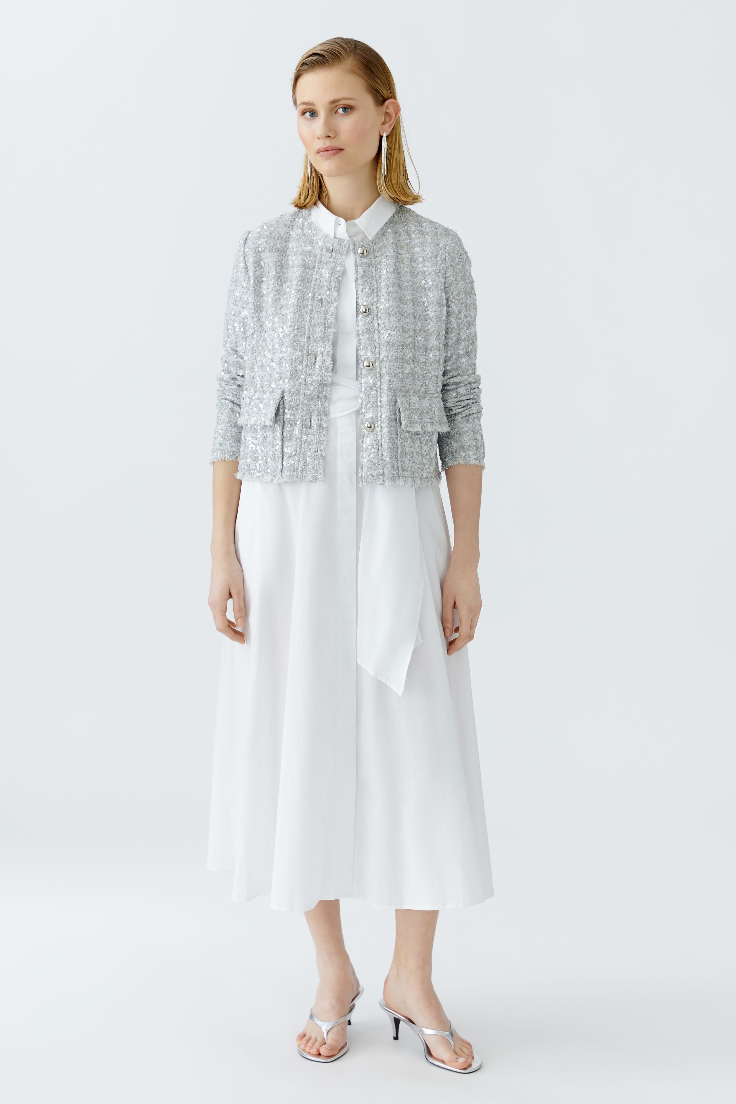 Oui silver jacket styled with crisp shirt and skirt