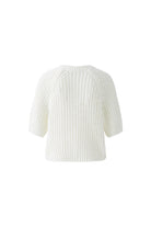Back flat lay of white rubber solar yarn knit cardigan from Oui