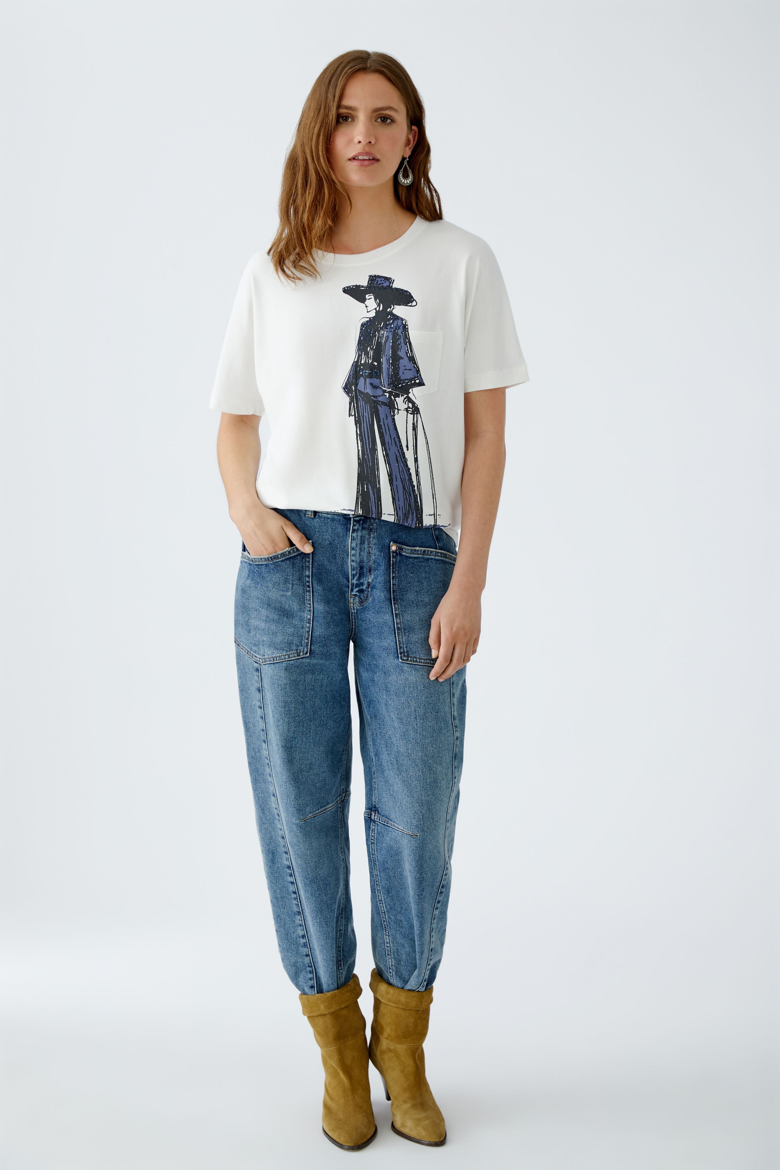 Full body view of Oui Rodeo Girl graphic tee paired with relaxed jeans and tan boots