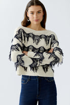 Oui Off-White Fringe Trim Jumper detail showing hand-cut fringe on model wearing dark blue jeans 