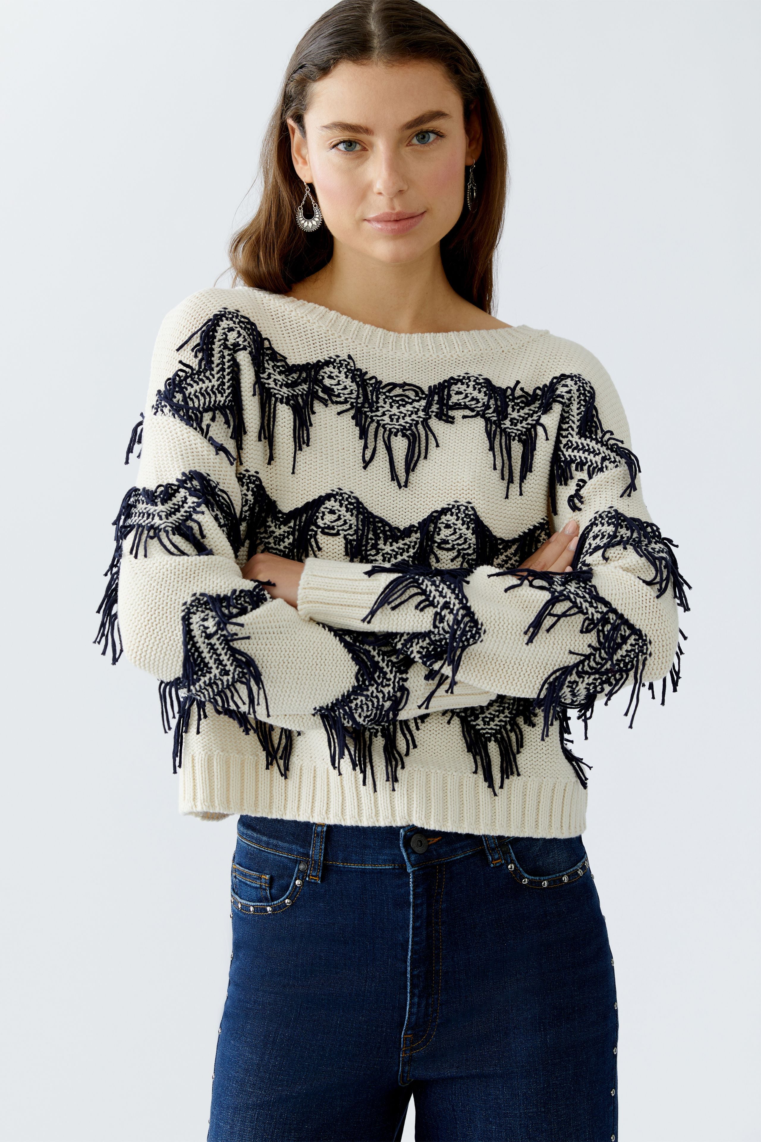 Oui Off-White Fringe Trim Jumper detail showing hand-cut fringe on model wearing dark blue jeans 