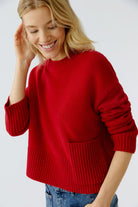 Oui red cropped jumper with long sleeves and side pocket, angled view