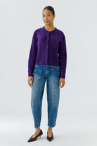 Oui purple soft knit cardigan styled with blue jeans
