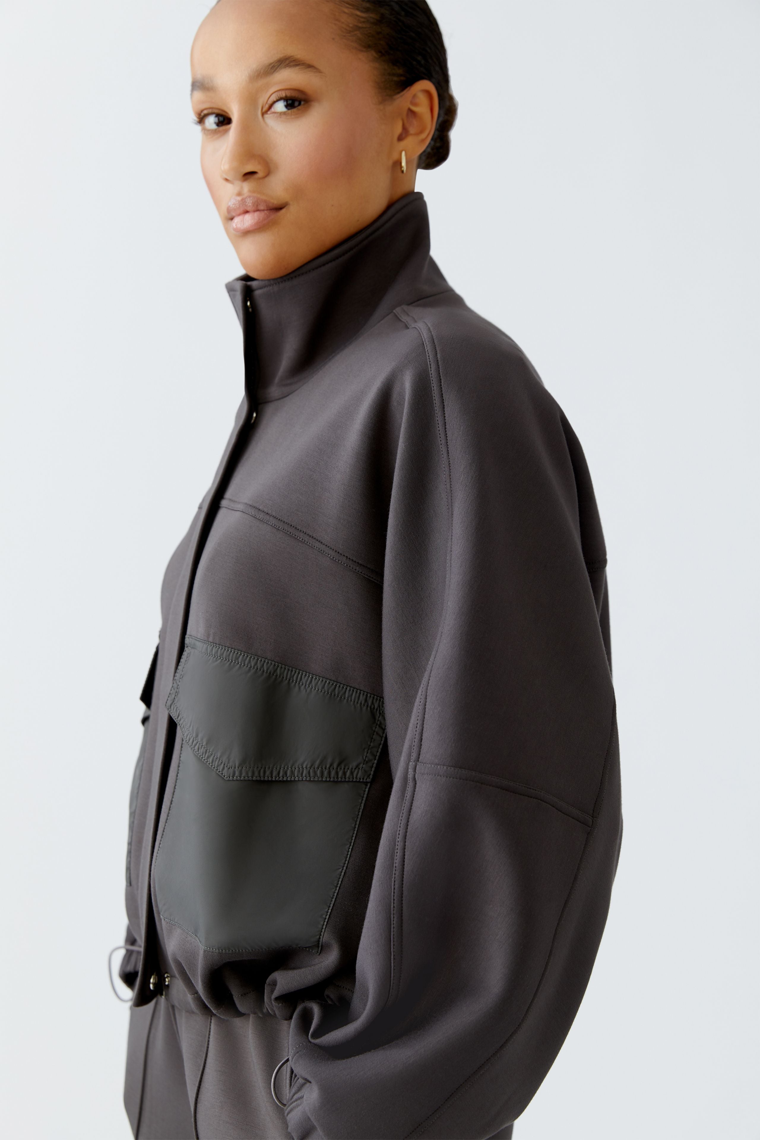 Side view of model showing jacket’s silhouette.