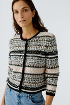 Oui Khaki Rose cardigan – side profile showing structured shoulders