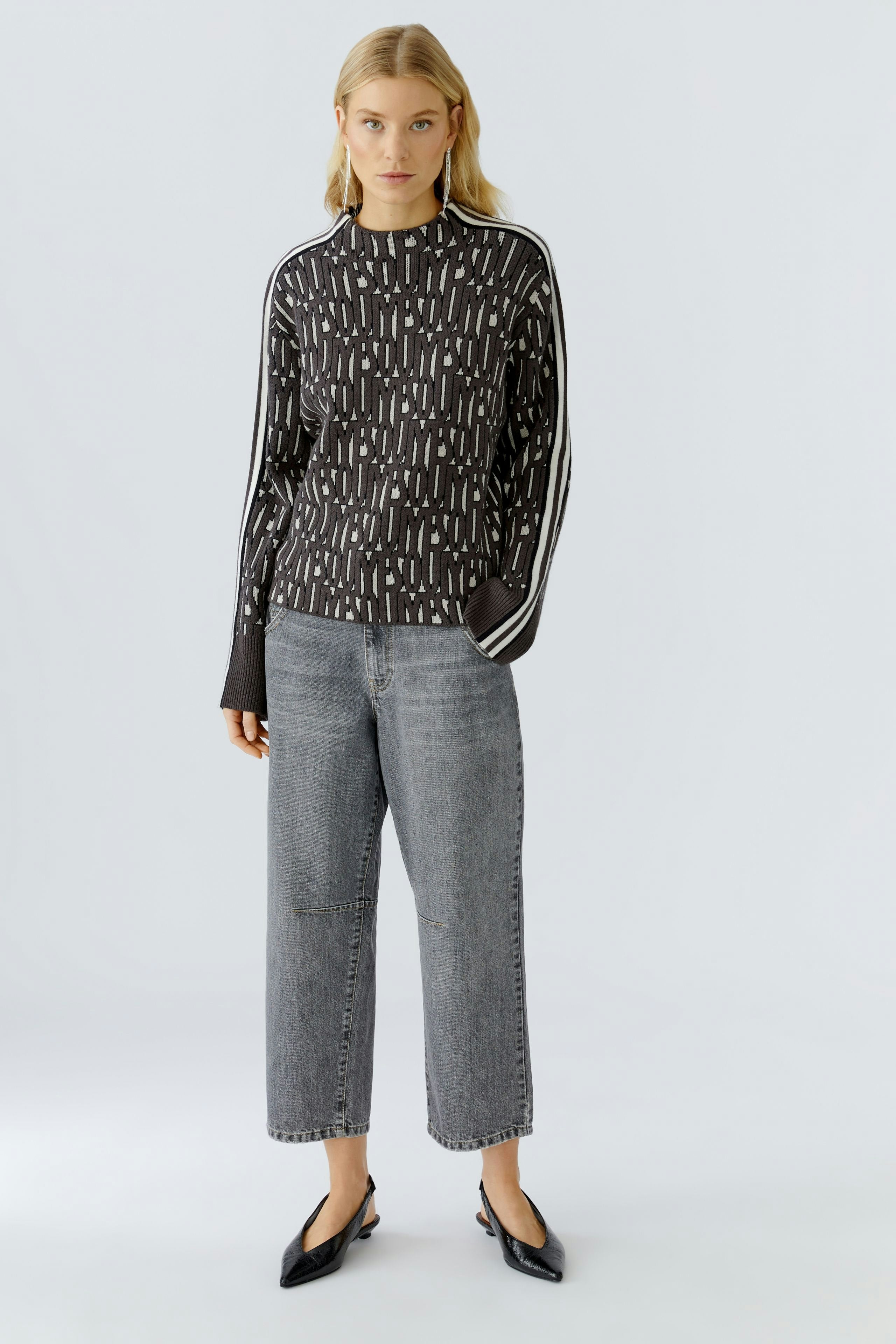 Oui sporty knitted letter print jumper styled with cropped jeans, full front view highlighting slightly cropped length