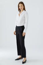 Oui NEYA black cropped culotte trousers styled with white shirt – three-quarter model view