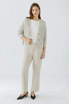 Oui NEYA cream culotte trousers styled with matching knit cardigan – front model view
