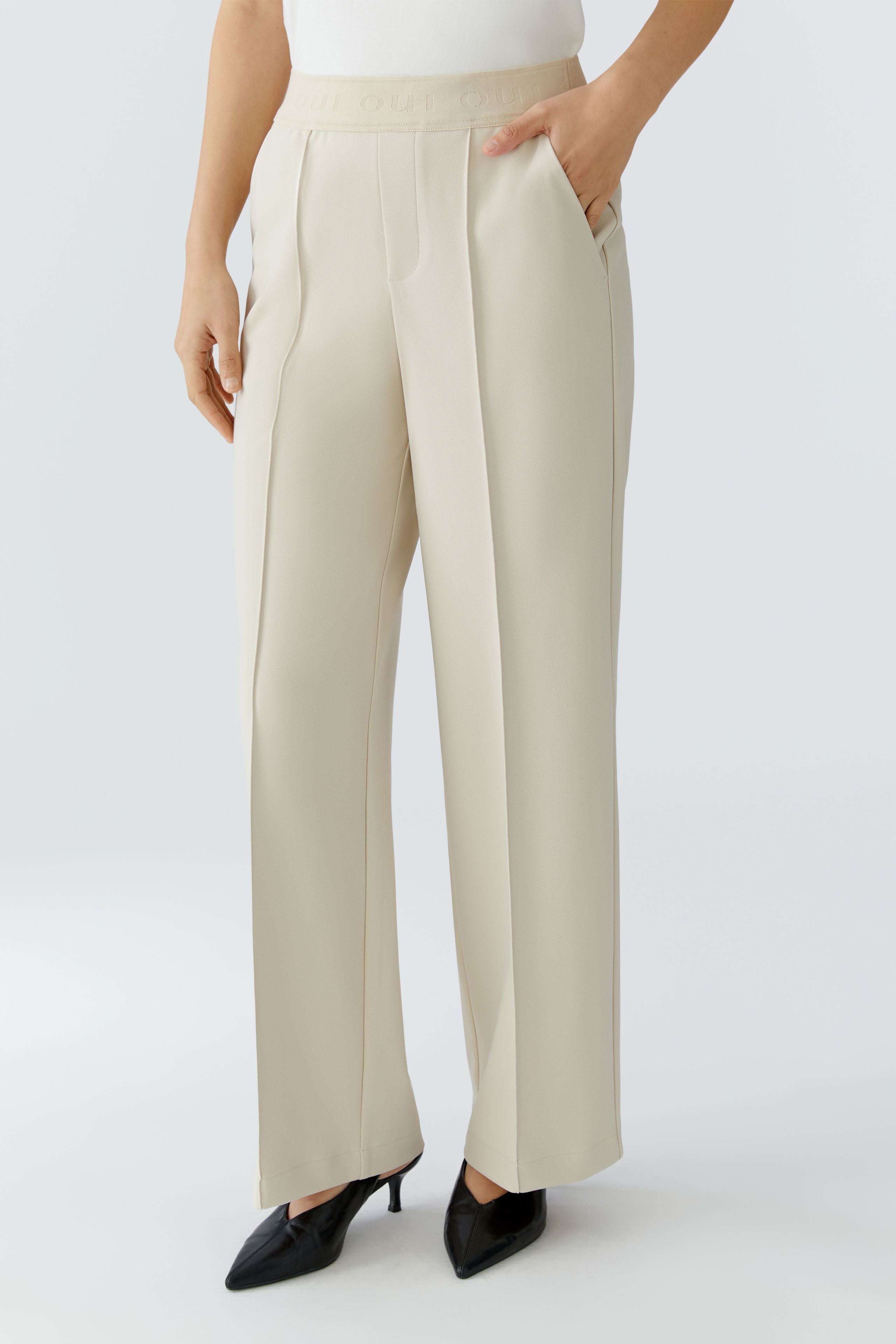 Oui beige technical jersey straight leg trousers front view
