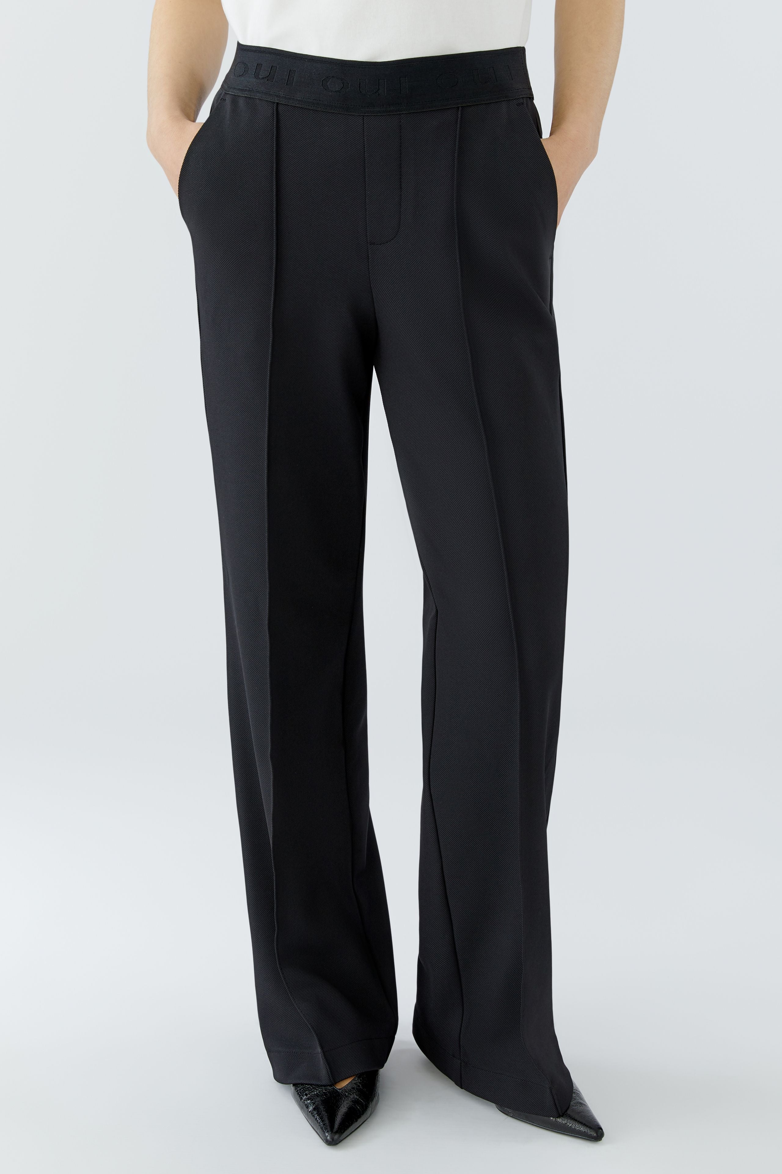 Oui black pull-on trousers front leg detail