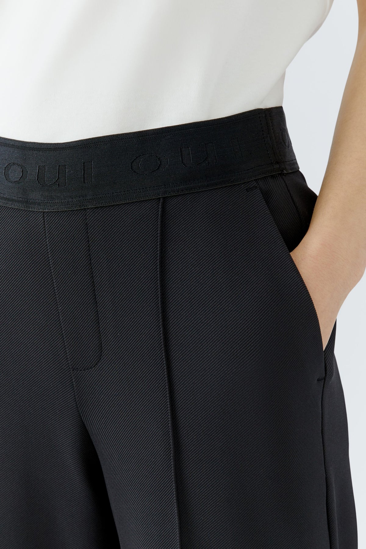 Oui black elastic waist trousers close-up with side pocket