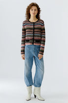 Oui knitted jacket close-up showing textured stripe knit and buttons