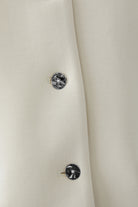 Oui cream women’s waistcoat button detail close-up