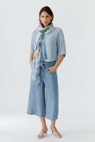 Oui blue floral scarf styled with outfit lightweight scarf