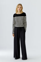 Oui Breton stripe cropped jumper styled with black wide leg trousers