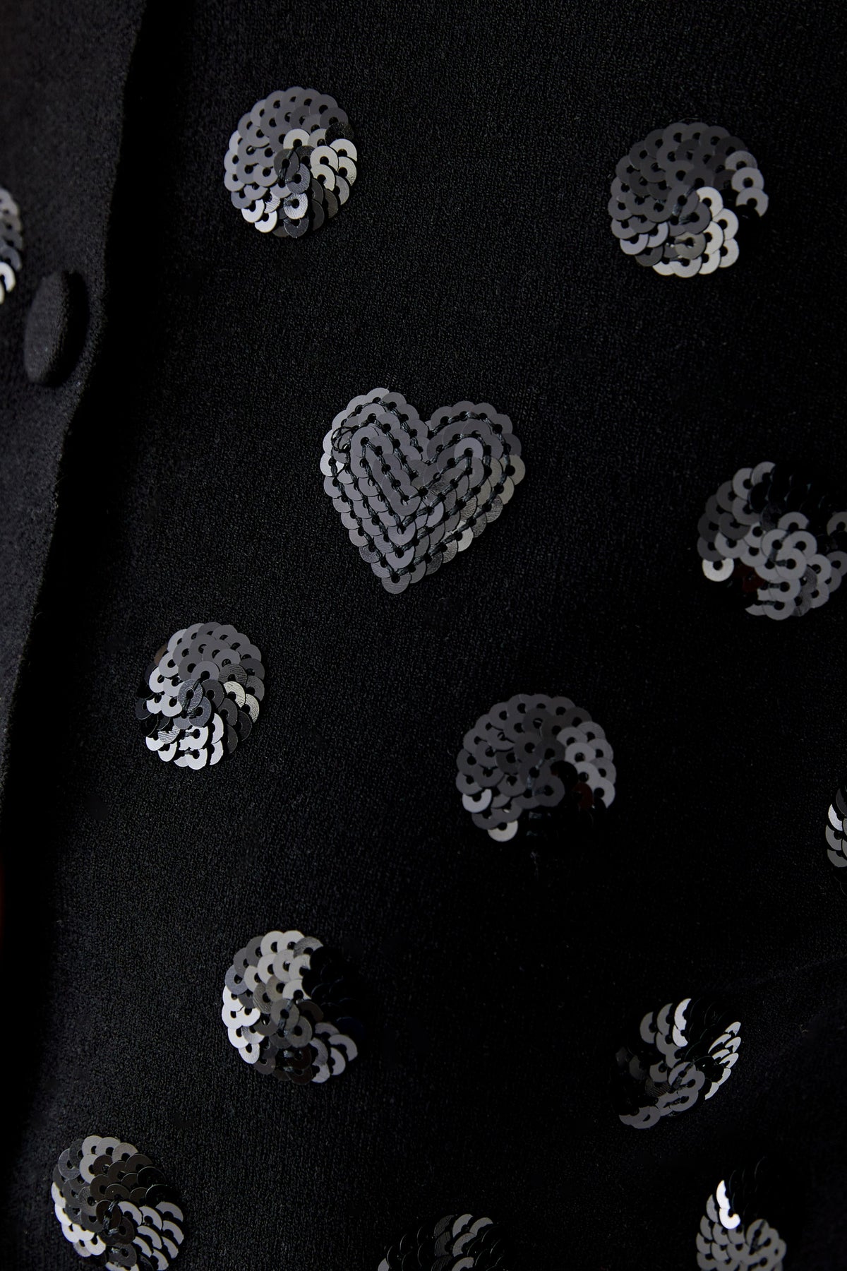 Oui black embellished fine knit cardigan styled with white trousers