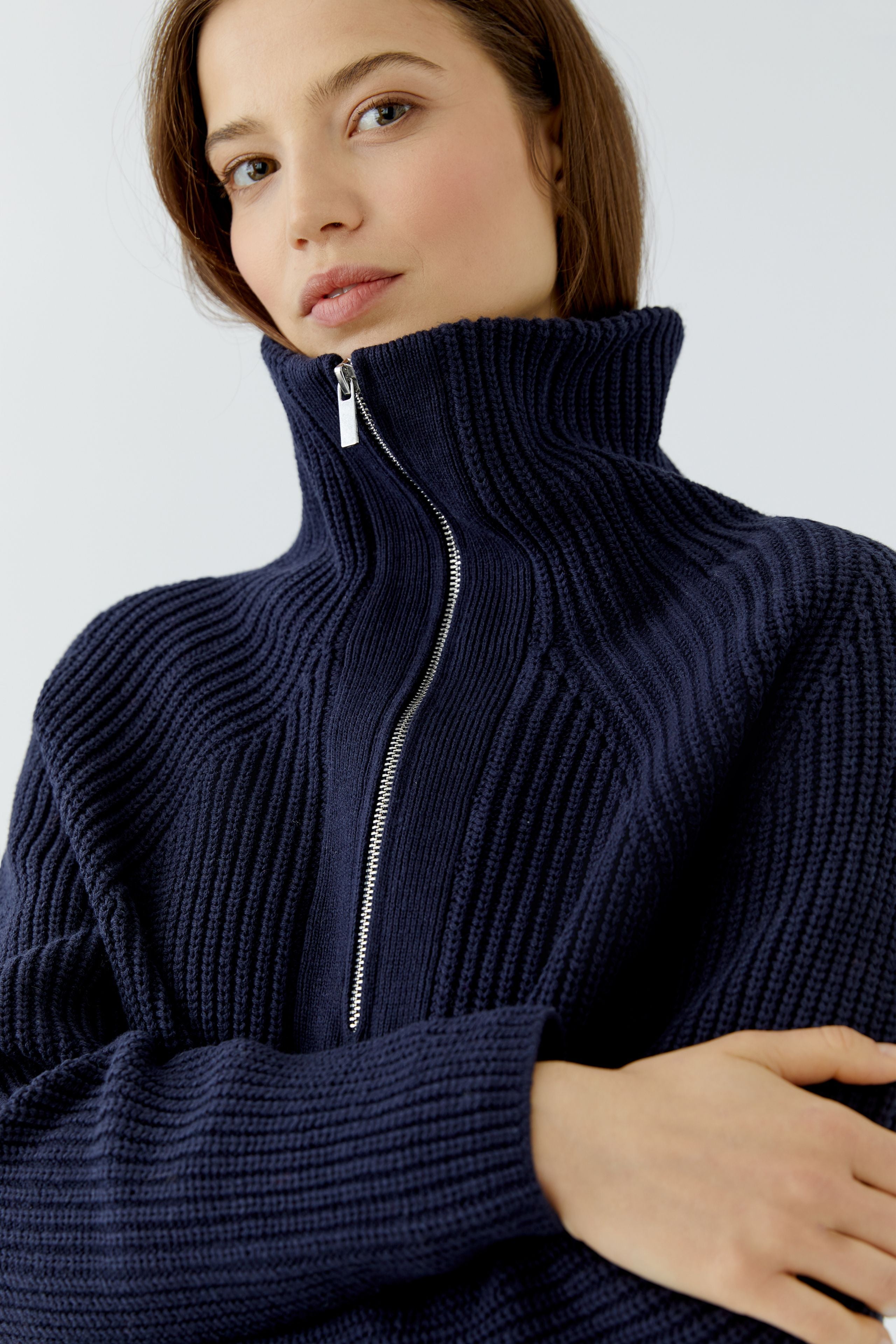 Oui navy ribbed jumper with half zip fastened into high funnel neck – detail view