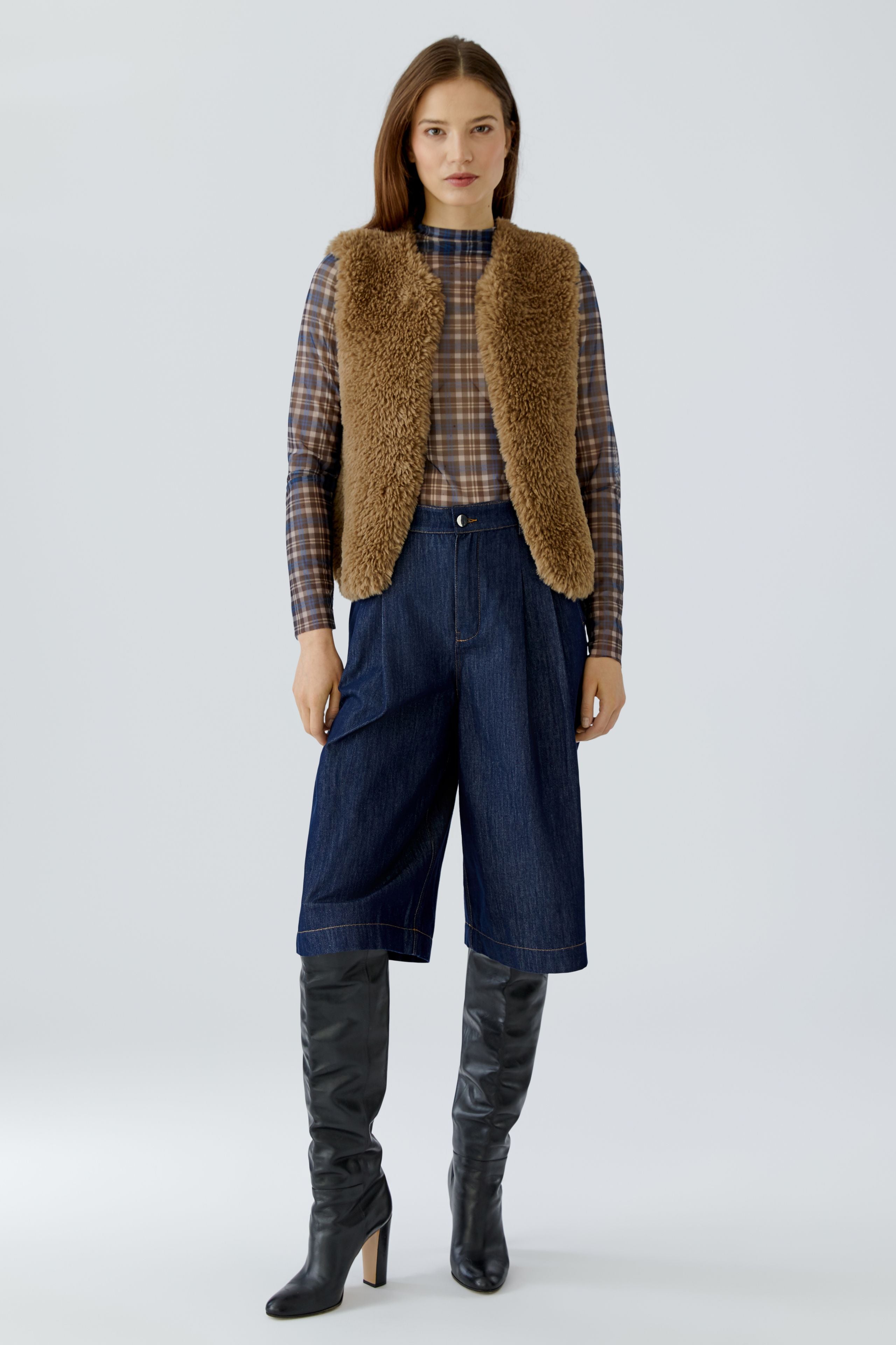 Oui brown short faux fur gilet layered over checked top – full outfit front view