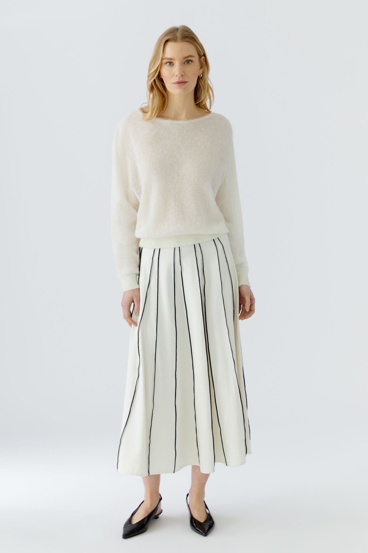 Oui pleated midi skirt styled with cream knit jumper