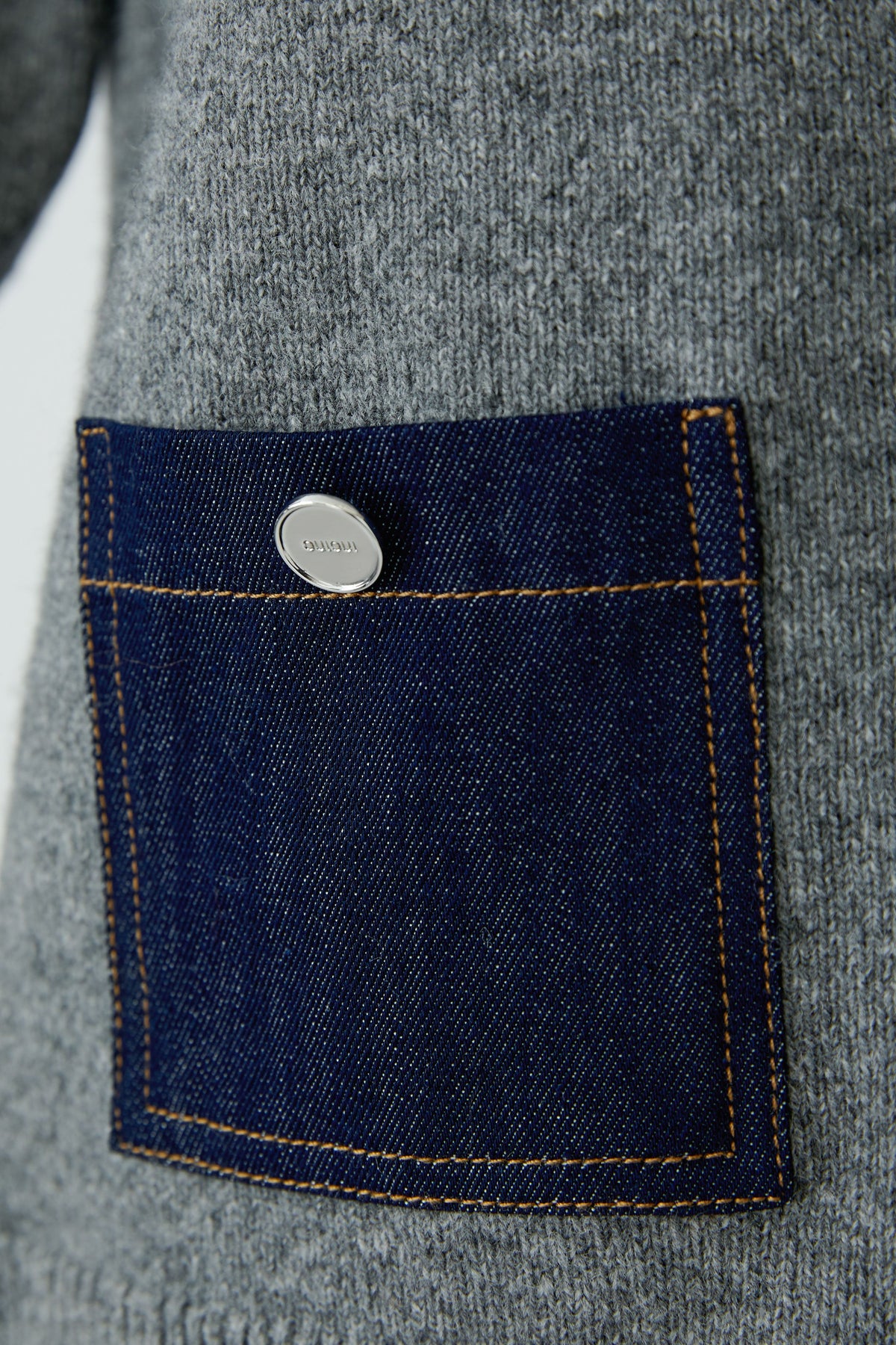 Oui grey knit jumper dark denim patch pocket with contrast stitching – close-up detail