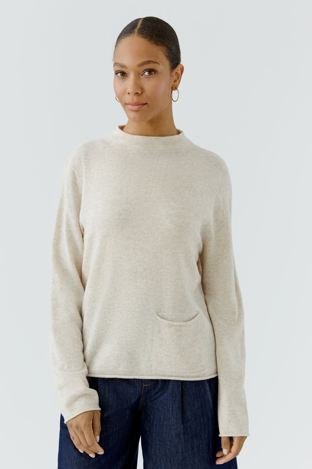Oui cream seamless wool modal jumper with stand collar and patch pocket – front model view