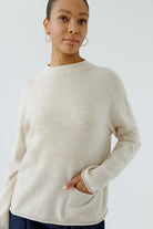 Oui cream wool blend pocket jumper with relaxed fit and long sleeves – close model view