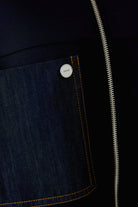 Oui navy scuba jacket with denim pocket, silver button and zip – close-up detail