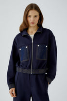 Oui navy scuba blouson jacket with denim patch pockets – front model view