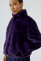 Oui Mysterioso faux fur jacket side and collar detail on model