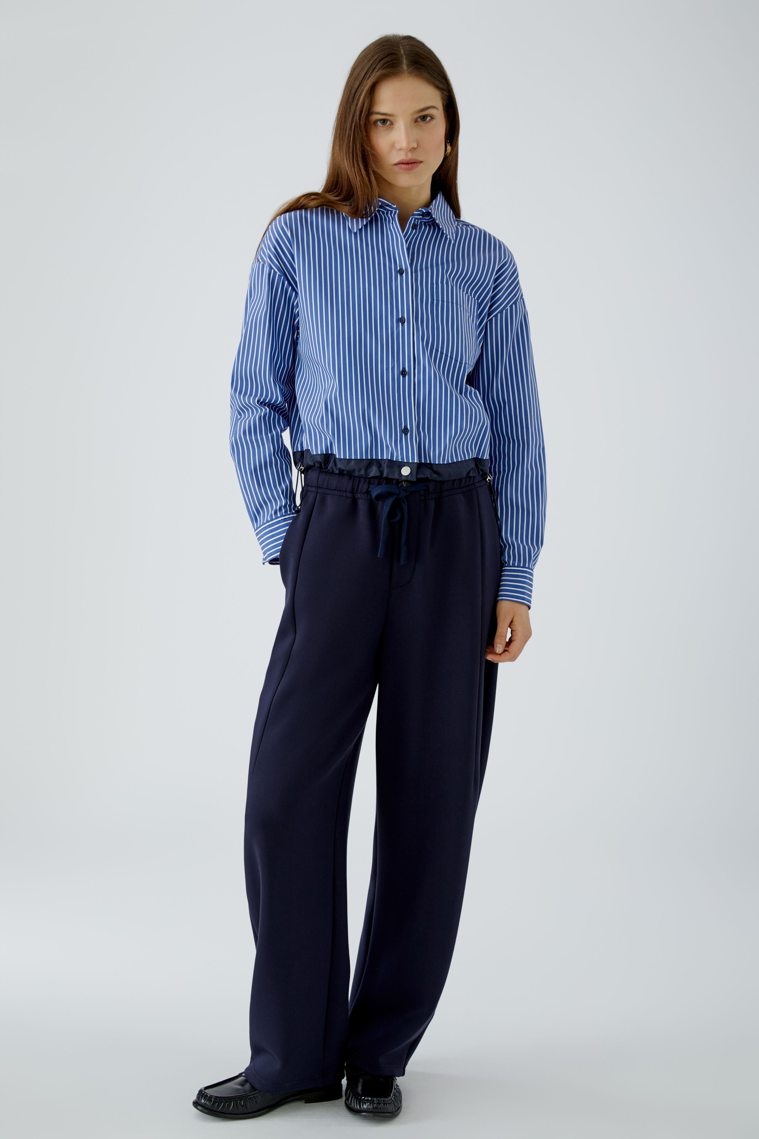 Oui women’s blue striped cropped shirt styled with navy trousers