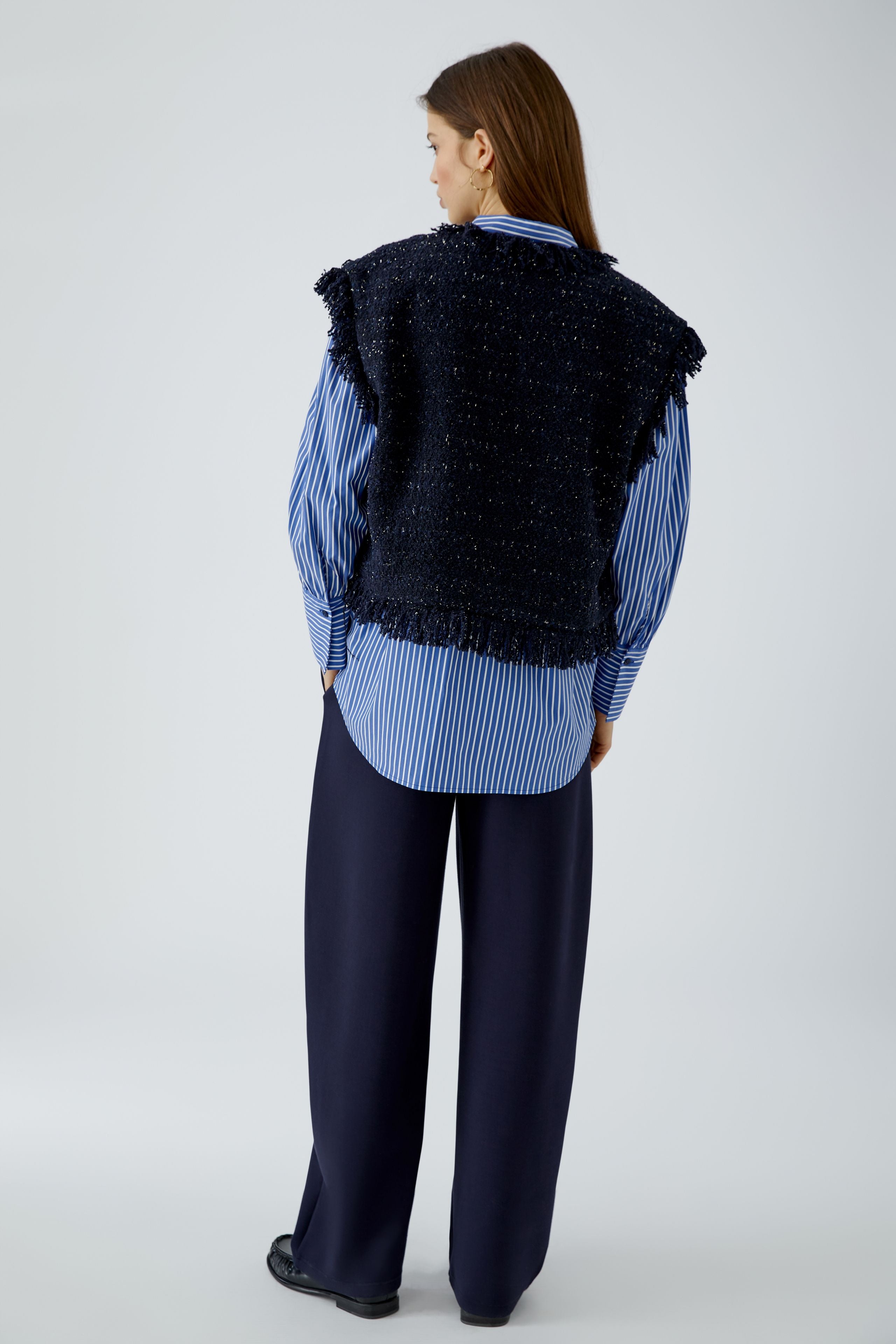 Oui women’s dark blue fringed waistcoat styled with navy trousers