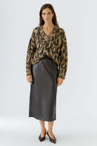 Oui brown leather-look midi skirt styled with an animal-print jumper