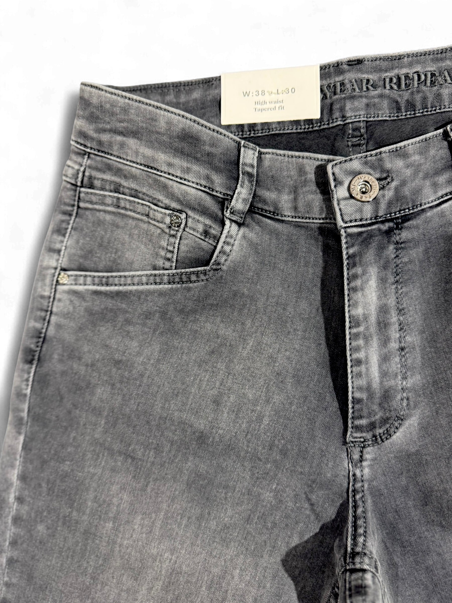 Front view of Para Mi slim jeans showing five-pocket design