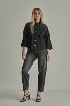 Para Mi Coco charcoal grey high waisted barrel leg jeans styled with brown fitted top – front model view