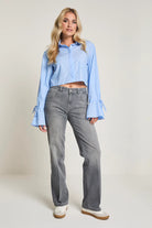 Woman wearing Para Mi Eve high waist grey wide-leg jeans
