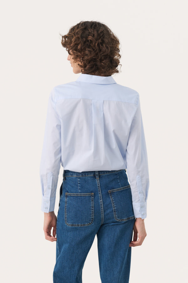 Back view of Nimini shirt showing classic tailoring and yoke detail