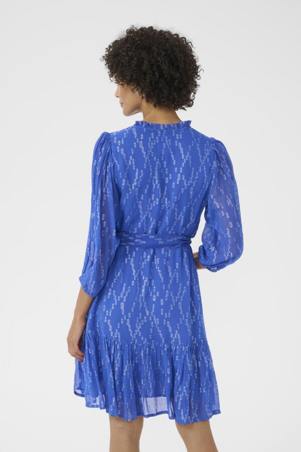 Back view of Part Two blue dress with tie waist and light texture