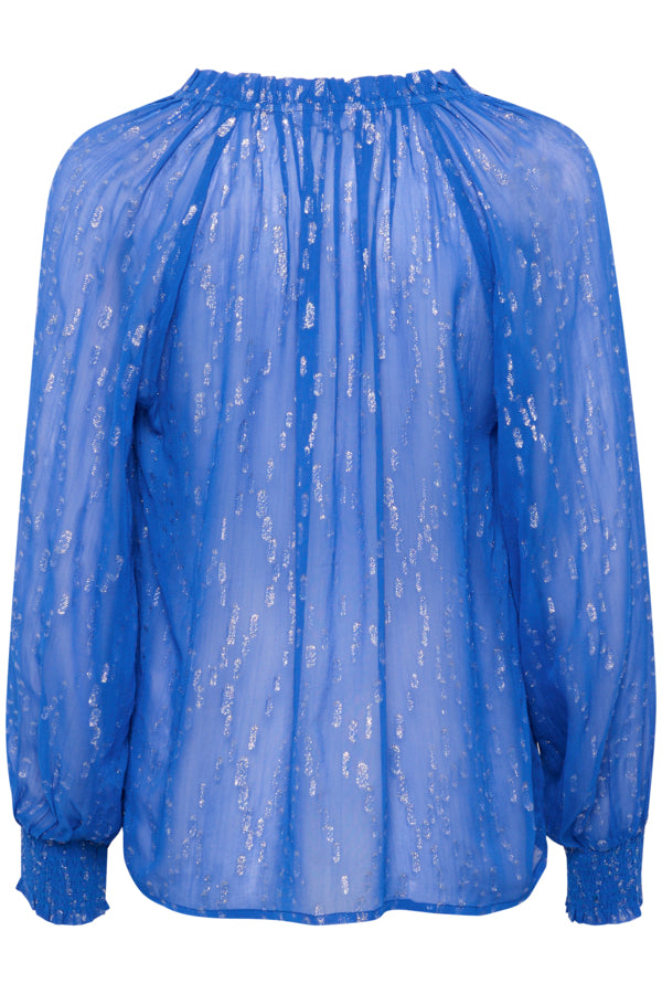 Back view of part two blue shimmer blouse with subtle smocking detail